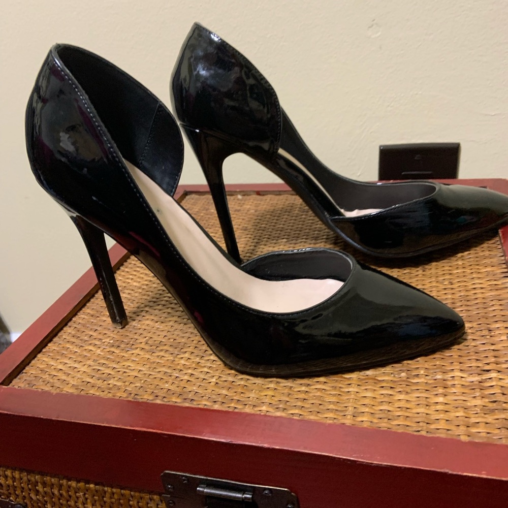 Black patent leather heels, cutout sided